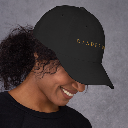 The Founder Cap in black — dad cap with gold CINDER HAUS embroidery, right side view